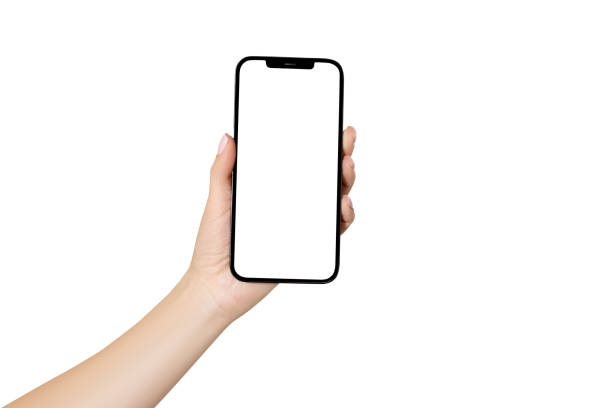 istock Female hand holding cell phone with blank screen on white background. Mockup 1663785253