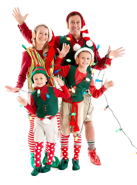 Photo of Family of Christmas Elves Tangled in Holiday LIghts