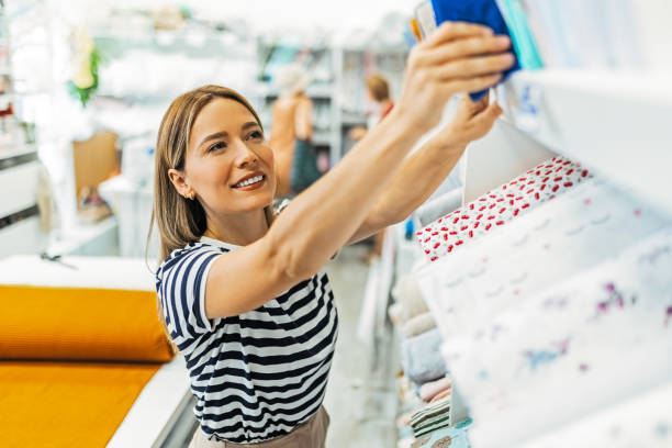 istock Portrait of a Storefront Seamstress 1663828950
