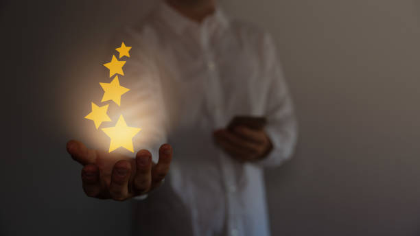 istock Customer evaluation feedback. men in suit Giving Positive Review for Client's Satisfaction Surveys. giving a five star rating. Service rating, satisfaction concept. 1663833535