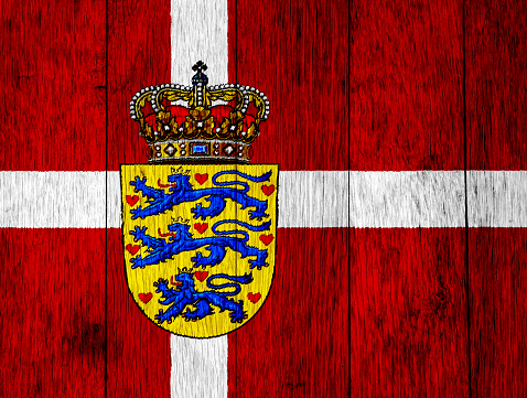 Flag and coat of arms of Denmark on a textured background. Concept collage.