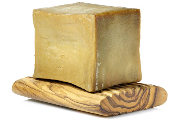 istock olive oil based hand-cut soap on underlay made of olive wood 1663841817