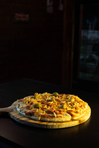 istock pizza with sausage and potatoes 1663841822
