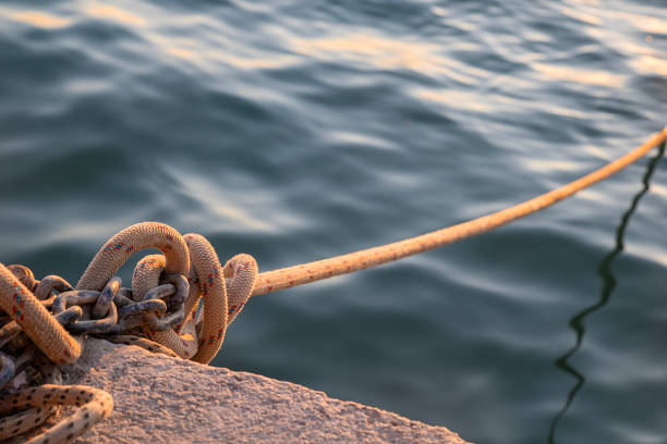 istock Rope moored on shore for mooring boats 1663854914
