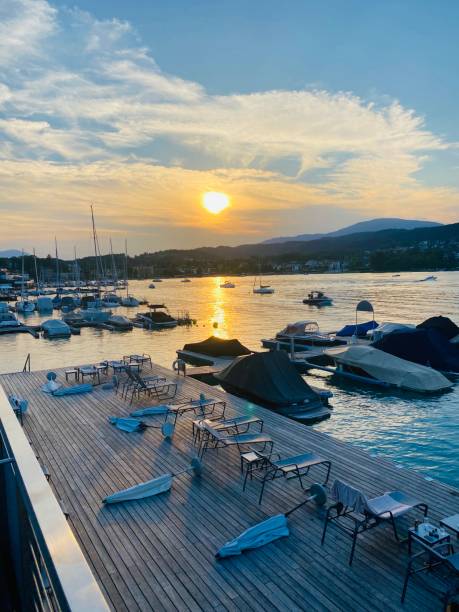 istock Jetty and nautical vessels in evening sun 1663864138