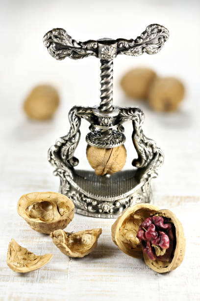 Nutcracker and walnuts isolated on a white background