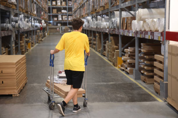 istock Boy shopping in warehouse 1663910266