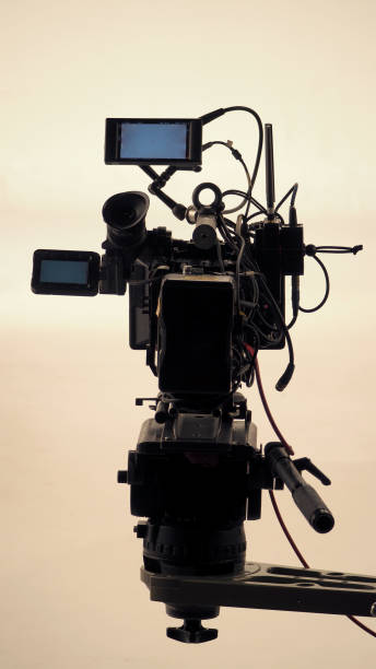 istock 4K high defination video camera with tripod shooting in studio production and no people. 1663950024