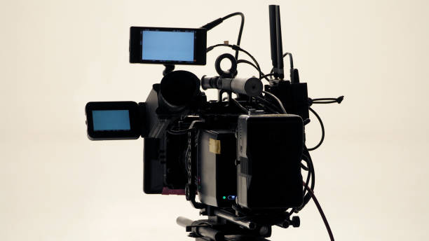 istock 4K high defination video camera with tripod shooting in studio production and no people. 1663950026