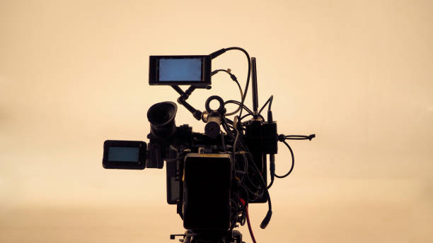 istock 4K high defination video camera with tripod shooting in studio production and no people. 1663950032