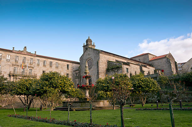 Santiago de Compostela, Galicia, Spain - September 20, 2019: View of a narrow street to Convent de Santa Maria de Belvis monastery in Santiago de Compostela, Galicia, Spain