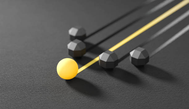 Leadership concept, Yellow leader smooth ball leading whites on compass