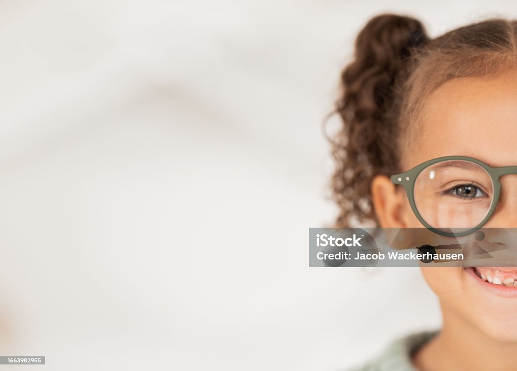 Mockup, advertising and girl with glasses from optometrist for vision in eyes at a clinic, store or shop. Half, happy and child with medical eyeglasses from optician with mock up space for marketing Child Stock Photo