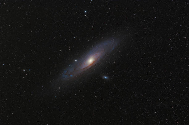 istock Andromeda Galaxy (M31) and its satellite galaxies (M32 and M110) in Andromeda constellation against widefield night starry sky 1663998392