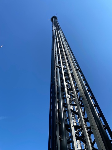 Free Fall tower fun ride at rollercoaster amusement park