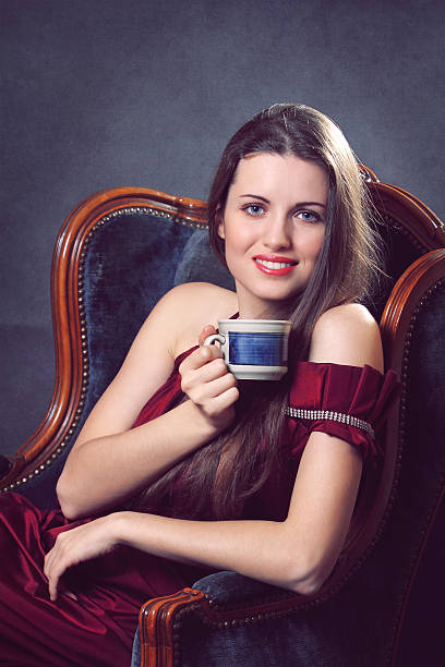 istock Elegant woman with cup of coffee 166404579