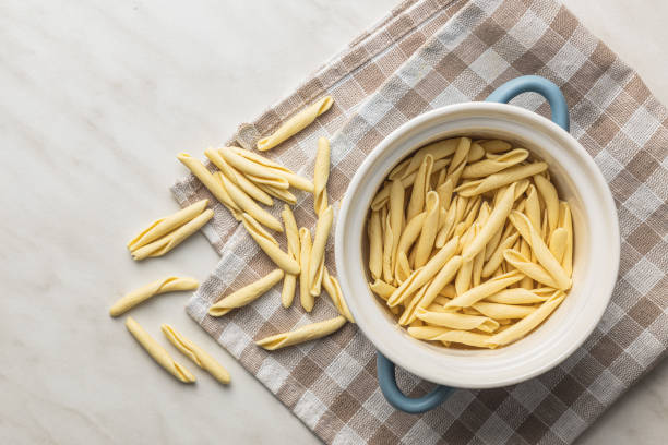 istock Fusilli pugliesi. Italian twisted pasta in pot. 1664070861