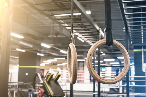 gymnastics rings for exercising in the gym, new and modern equipment for sportsmen
