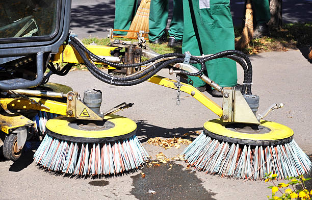 istock brushes of a street cleaner machine 166408959