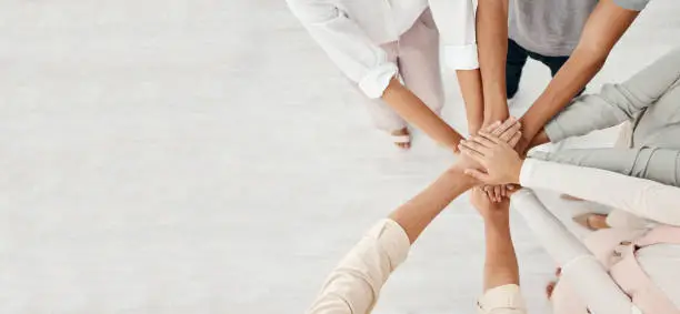 Photo of Hands, support and solidarity in team with community in workplace, professional partnership and collaboration mockup. Team building overhead, business people and diversity, company mission together.