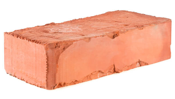 istock Old red brick isolated on a white background. Single red clay rough brick. 1664090459
