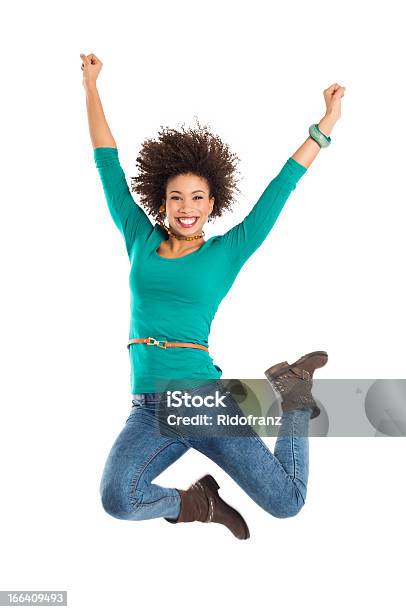 Woman Jumping In Joy Stock Photo - Download Image Now - White Background, Jumping, Women