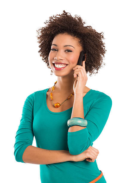 portrait of woman talking on cellphone - teenage girls pretty smile looking at camera waist up fotografías e imágenes de stock