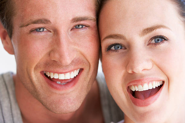 istock Portrait Of Smiling Couple 166410101