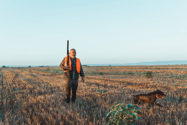 istock A mature Caucasian male hunter going on a hunt with his dog 1664107036