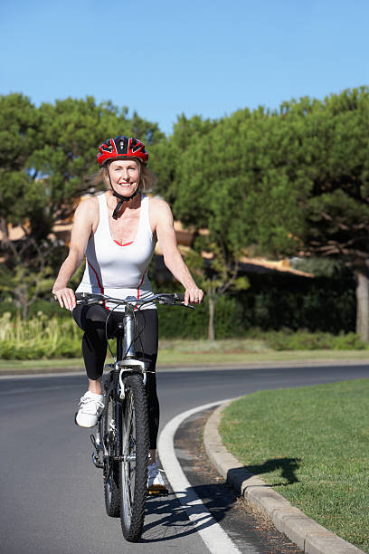 istock Senior Woman On Cycle Ride 166412123