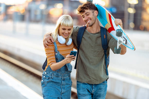 istock Urban young people on a railroad station 1664139433