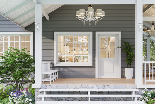 Modern luxury front home entrance porch 3d render with gray wooden walls and white doors decorated with chandeliers surrounded by flower gardens.