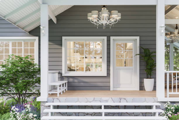 Modern luxury front home entrance porch 3d render Modern luxury front home entrance porch 3d render with gray wooden walls and white doors decorated with chandeliers surrounded by flower gardens. stairwell chandelier stock pictures, royalty-free photos & images