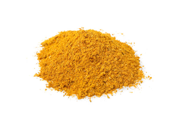 istock Heap of curry powder isolated on white 1664140059