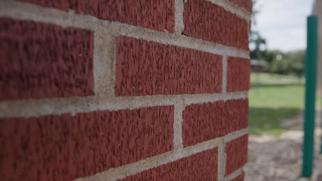 Red brick details in slow motion