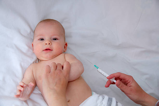 istock Little baby get an injection 166416651