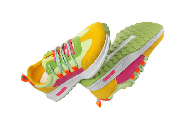 istock Pair of stylish colorful sneakers on white background 1664169021