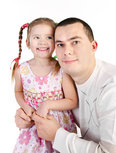 istock Smiling little girl with her father isolated 166417237