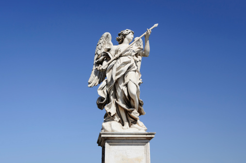 View of one of angels on Saint Angelo bridge in Rome, Italy