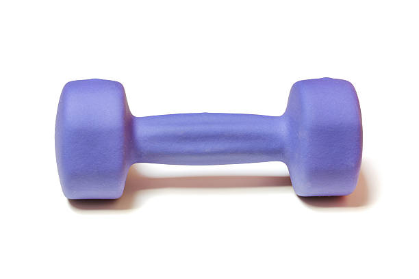 Dumbbell lifting weights for fitness in violet color, isolated stock photo