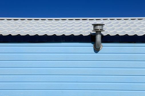 side view of a blue holiday home