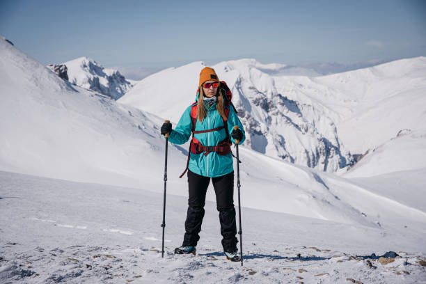 istock Woman mountain climbing 1664208480