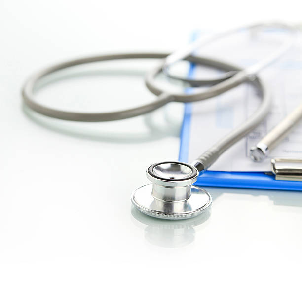 istock Stethoscope with blue medical clipboard 166421162