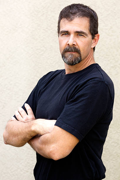 istock Man with arms crossed 166422532