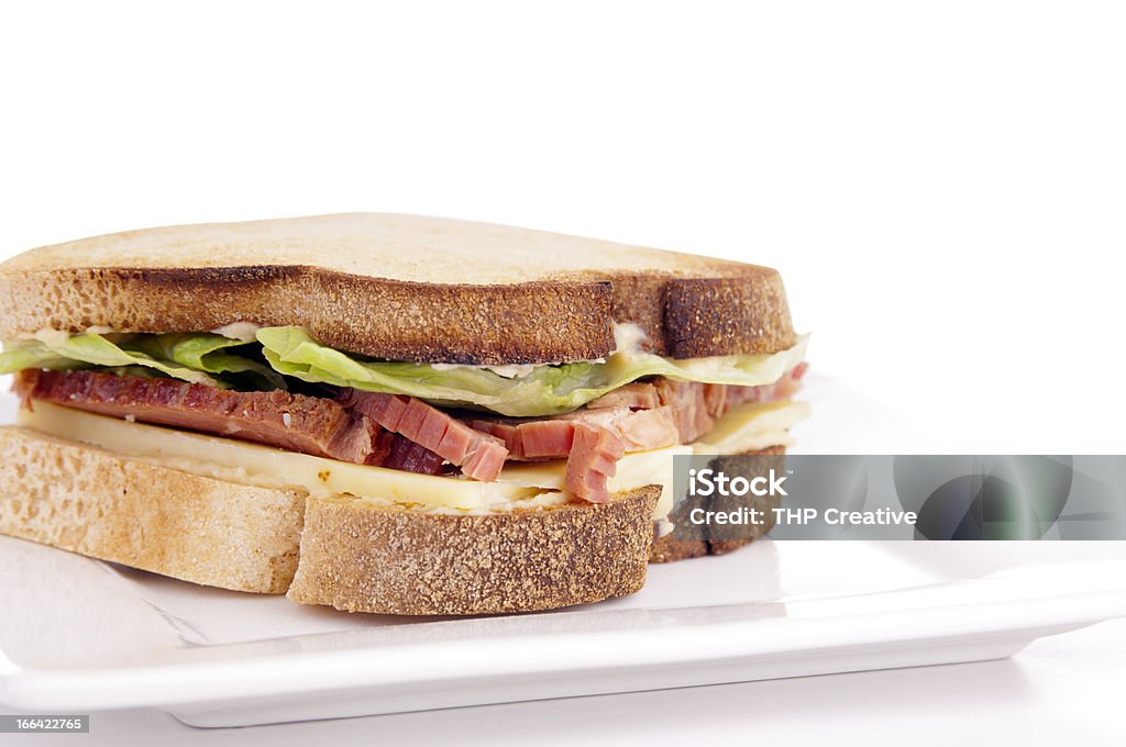 Gluten Free Sandwhich Gluten free sandwich with home-made bread, cheese, roast beef and lettuce Allergy Stock Photo