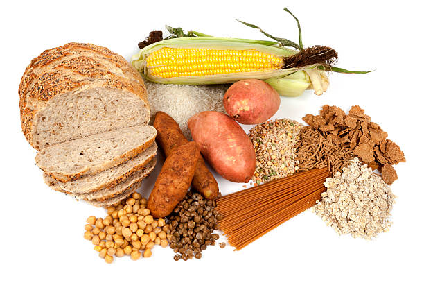 complex carbohydrates food sources - zoete aardappel fotos stockfoto's en -beelden