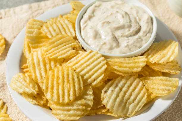 istock Organic Crinkle Potato Chips and French Onion Dip 1664254954