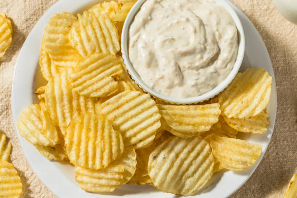 istock Organic Crinkle Potato Chips and French Onion Dip 1664255503
