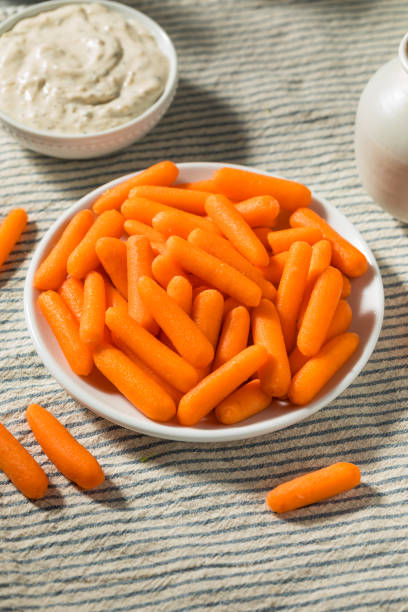 Orange Organic Raw Baby Carrots stock photo