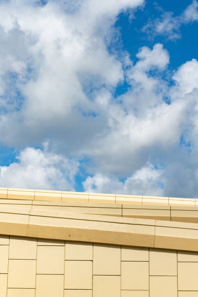 istock Abstract Background of Concrete Wall and Cloudy Sky 1664267051